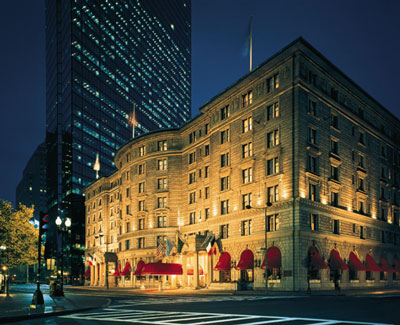 Exterior at night with Hancock Tower