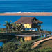 The Palafito Master Suites are built on stilts over the water, providing views of the estuary, the beach, and the ocean beyond.
